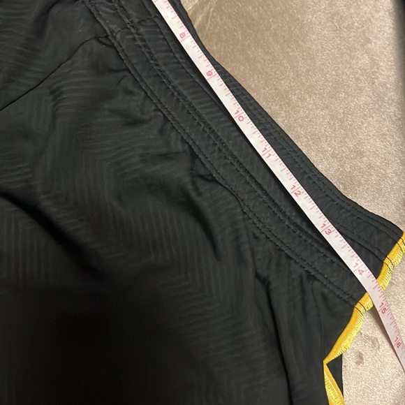 Nike dry fit shorts in black and gold. Live strong logo. - Picture 6 of 10